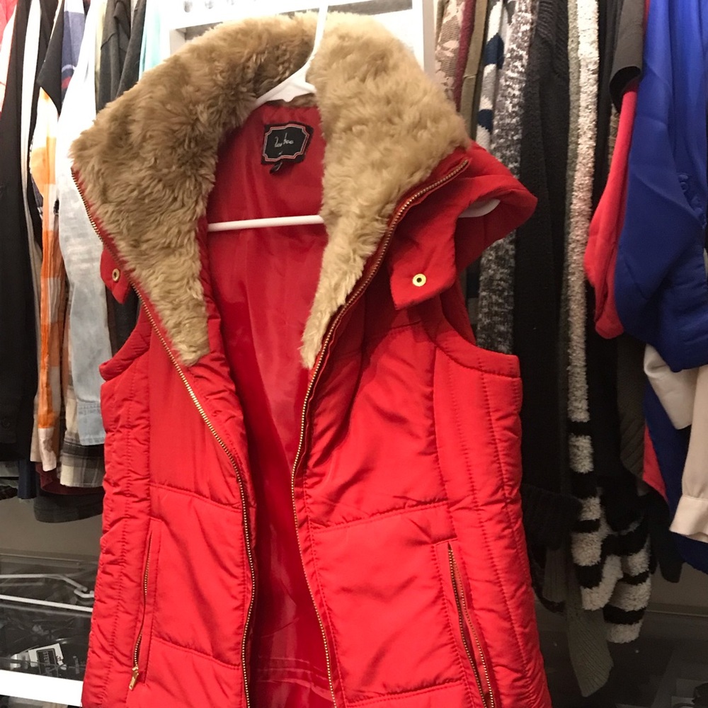 Red hooded vest with faux fur collar